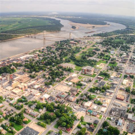 an aerial view of a city and river