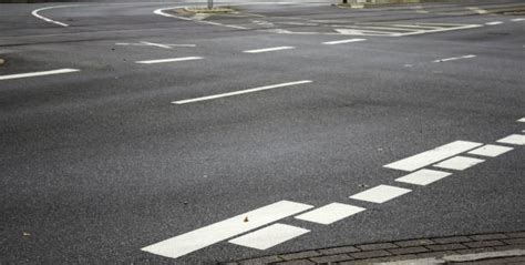 80+ Close Up Of Double White Lines On Pavement Stock Photos, Pictures ...