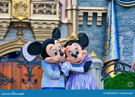 Minnie And Mickey Mouse Holding Hands Cartoon