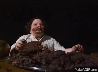 Fat kid eats a chocolate cake on Make a GIF