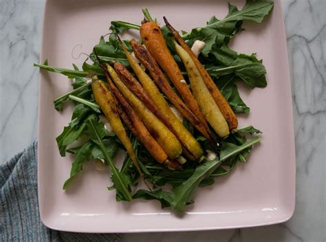 Sweetly Spiced Roasted Carrots over Greens - Witten Kitchen