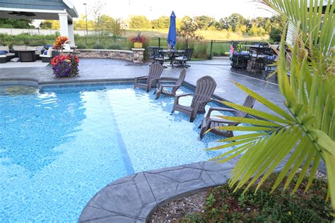 Cool off and enjoy the view with a wading area in your pool. Call ...