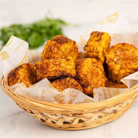 a basket filled with tofu sitting on top of a table