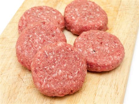 Raw beef burgers stock photo. Image of burger, uncooked - 19315496