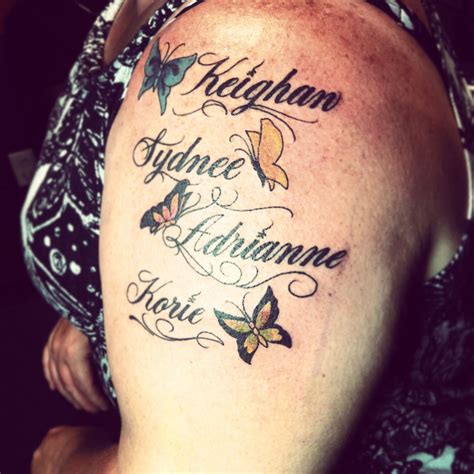 My moms tattoo for her grandkids | Grandchildren tattoos, Tattoos with kids names, Name tattoos