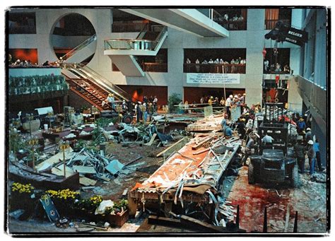 Workers cleaning up after the 1981 Hyatt Regency walkway collapse, a structural failure which ...