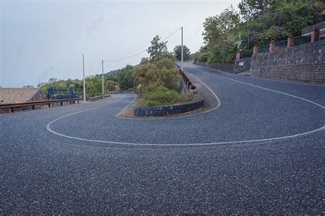 The Curve Road On A Mountain With Trees Photo Background And Picture ...