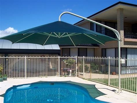 Umbrella swimming pool sun protection ideas modern patio design | Pool shade, Patio shade, Shade ...