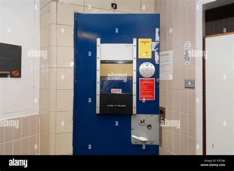 Metropolitan Police prisoner 's cell door in a Police station custody Stock Photo, Royalty Free ...