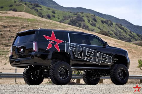 Lifted Yukon XL on 38" TOYO M/T Tires by RBP — CARiD.com Gallery