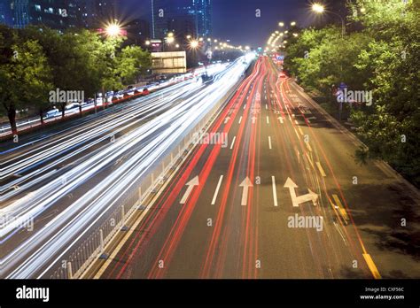 beijing night scene in rush hour traffic Stock Photo - Alamy