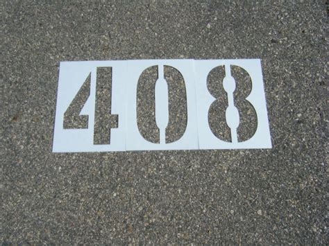 How to stencil parking lot identification numbers | MyParkingSign.com Blog