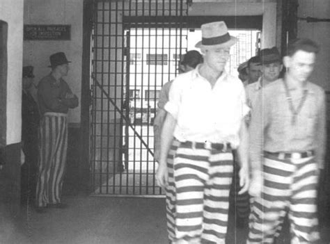 Florida Memory - Raiford prison inmates walking through prison doors