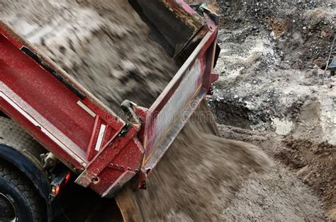 Dump truck unloading sand stock photo. Image of road - 166136806