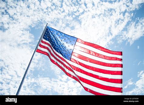 American Flags Blowing in the Wind Stock Photo - Alamy