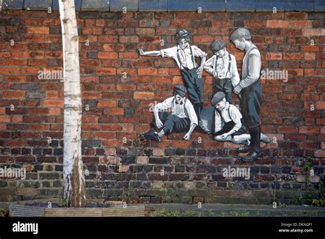 Exterior wall art on a brick wall in Ranelagh Road,Weymouth,Dorset Stock Photo - Alamy