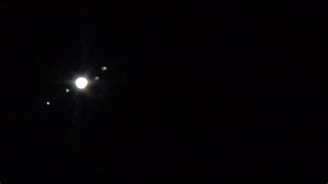 Jupiter + moons through a telescope - YouTube