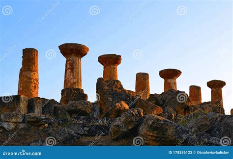 Ruined Temple of Heracles Columns in Famous Ancient Valley of Temples on Sunset in Summer Day ...