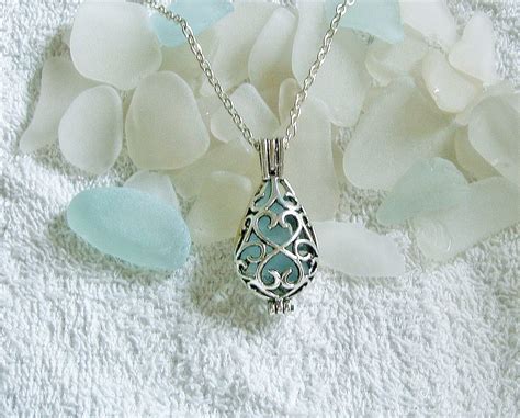 Beach glass jewelry. Beach glass locket sea glass necklace.