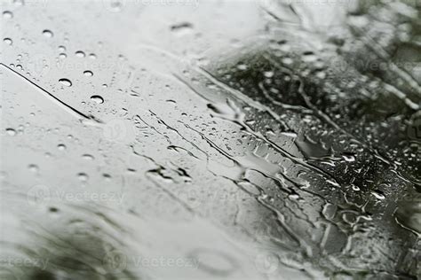 Heavy rain background, Raindrops on window glass outdoors 2789848 Stock Photo at Vecteezy