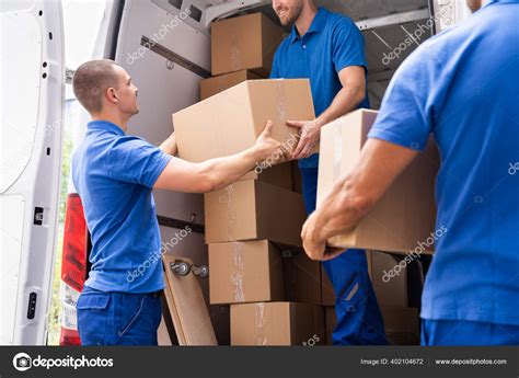 Truck Movers Loading Van Carrying Boxes Moving House Stock Photo by ©AndreyPopov 402104672