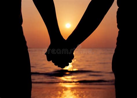 Silhouettes Couples Holding Hands Stock Image - Image of hands, coast ...