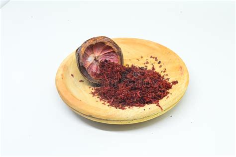 Mangosteen Peel and Mangosteen Peel Powder on Top of a Wooden Bowl ...