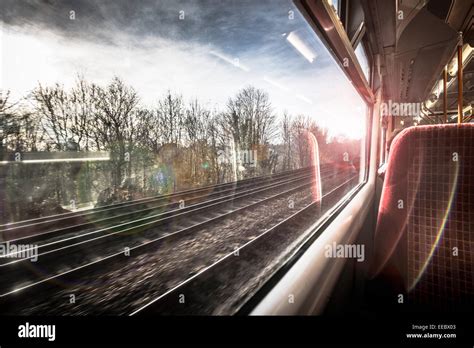 Moving train window view Stock Photo - Alamy