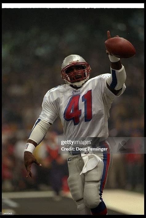 Running back Keith Byars of the New England Patriots celebrates after... News Photo - Getty Images