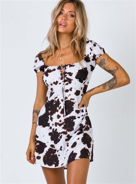 Everything You Need to Know About the Cow Print Outfit Trend