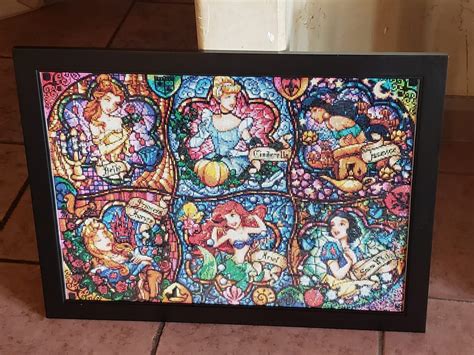 "Finished and framed my Disney Princesses today!! Loved working on this one and all the colors ...