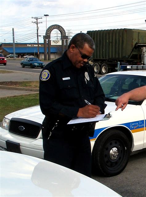 A Clarksville, TN Police officer takes a accident report - Clarksville ...