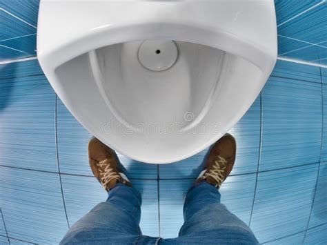 Man Stands in Front of Toilet in Toilet and Tries To Urinate. First-person View Stock Image ...