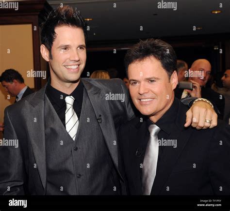 David Osmond (L) and Donnie Osmond attend the National Multiple ...