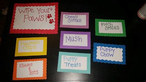 four different types of dog treats on a table with the words, wipe your paws and puppy bites