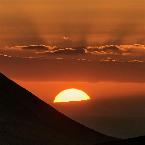 Green Flash At Sunset Photograph by Babak Tafreshi