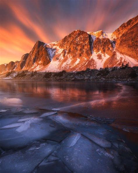 A stunning light display during sunrise at the Snowy Mountain Range in Medicine Bow National ...