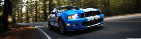 Blue and white Ford Mustang on gray concrete road HD wallpaper ...