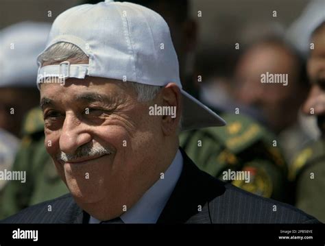 Palestinian President Mahmoud Abbas, also known as Abu Mazen, wears a ...