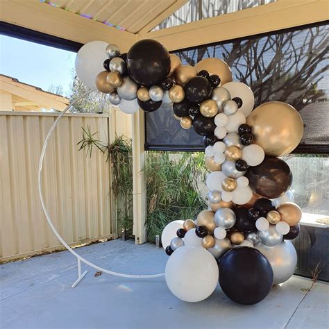 Gold, Silver, White and Black Balloon Garland in 2021 | Gold balloons decorations, Black and ...