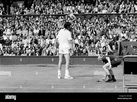 Tennis - Wimbledon Championships 1977 - Ilie Nastase v Tom Okker Stock Photo - Alamy