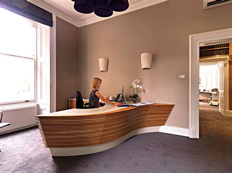 Bespoke curved reception desk from solid oak and Corian top surface | Casework | Pinterest ...