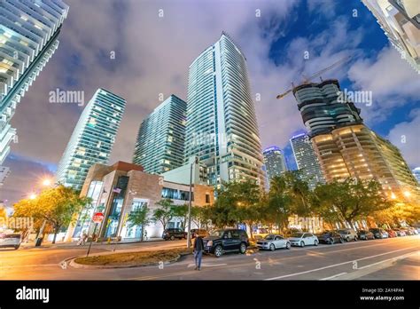 Downtown Miami skyscrapers at night from street level Stock Photo - Alamy