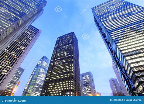 Low Angle View of Modern Building Stock Photo - Image of illuminated, district: 41169664