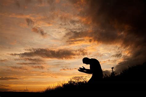 7,300+ Kneeling In Prayer Stock Photos, Pictures & Royalty-Free Images - iStock