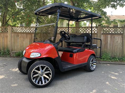 Custom Red EZGO RXV 2+2 with long roof - Big Thunder Golf Carts