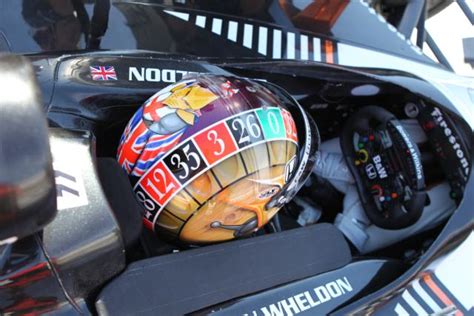 Dan Wheldon showing off a Vegas theme on his helmet this w… | Flickr