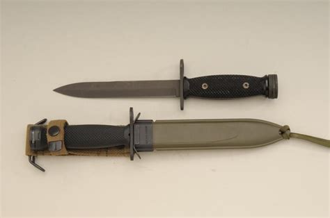 US M4 bayonet by Imperial in very good condition with slight edge or sharpening. Along with US M4