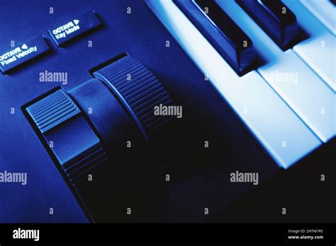 Closeup view of pitch and modulation wheels of a modern synthesizer Stock Photo - Alamy