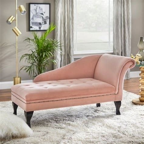 A velvet chaise lounge with a secret... it opens up to hold throws and ...